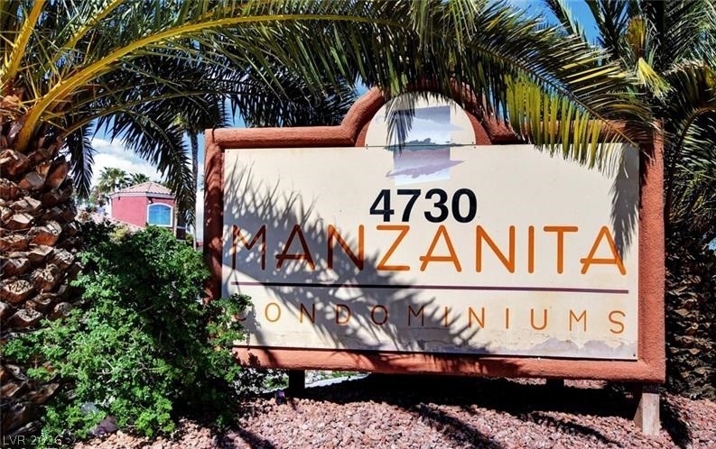 4730 East Craig Road, Unit 2102 Las Vegas, NV 89115 - Photo 7 of 13 An inviting sign marks the entry to the Manzanita Condominiums.