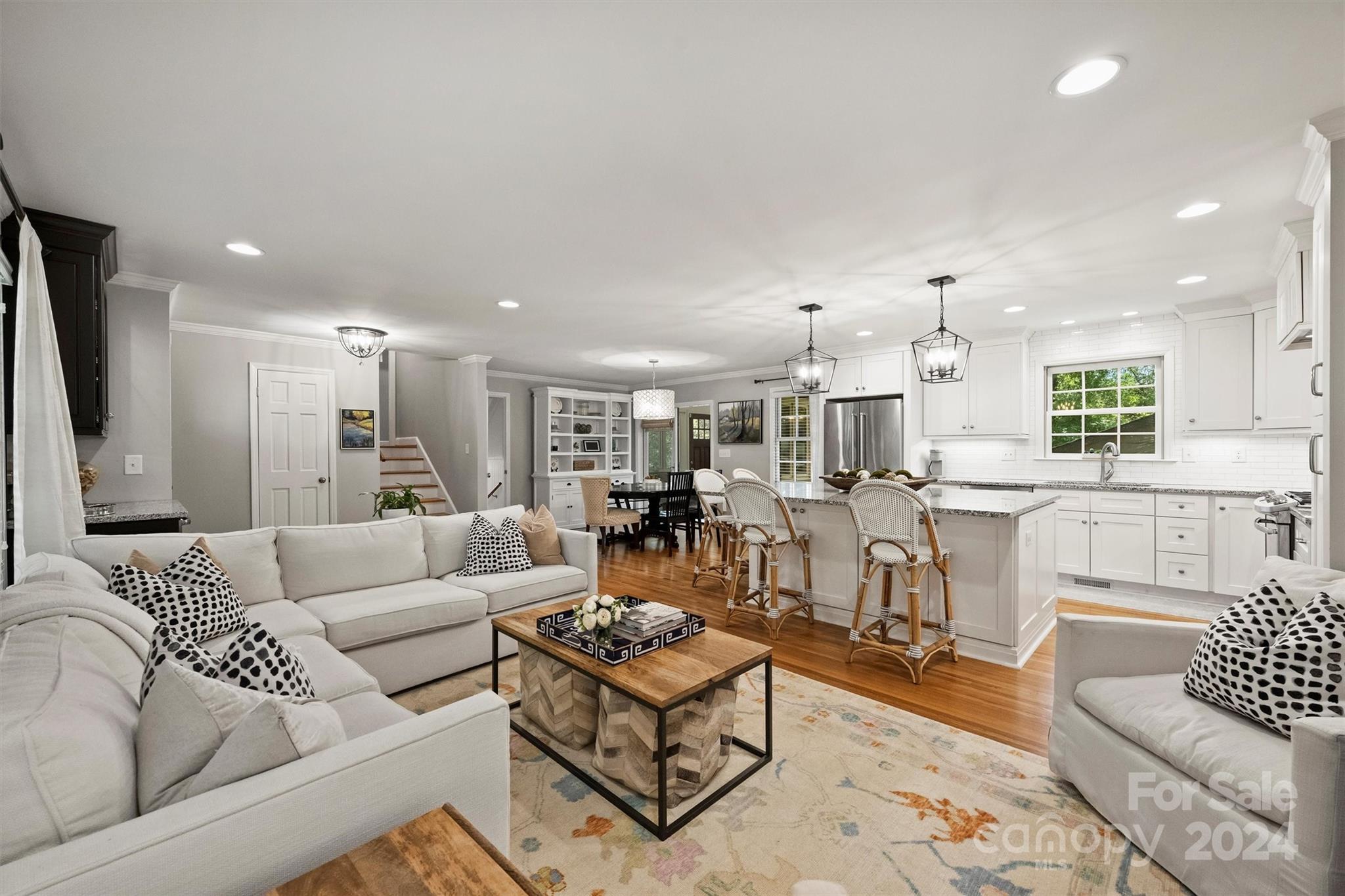 3820 Sulkirk Road Charlotte, NC 28210 - Photo 11 of 48 a living room with furniture kitchen view and a large window