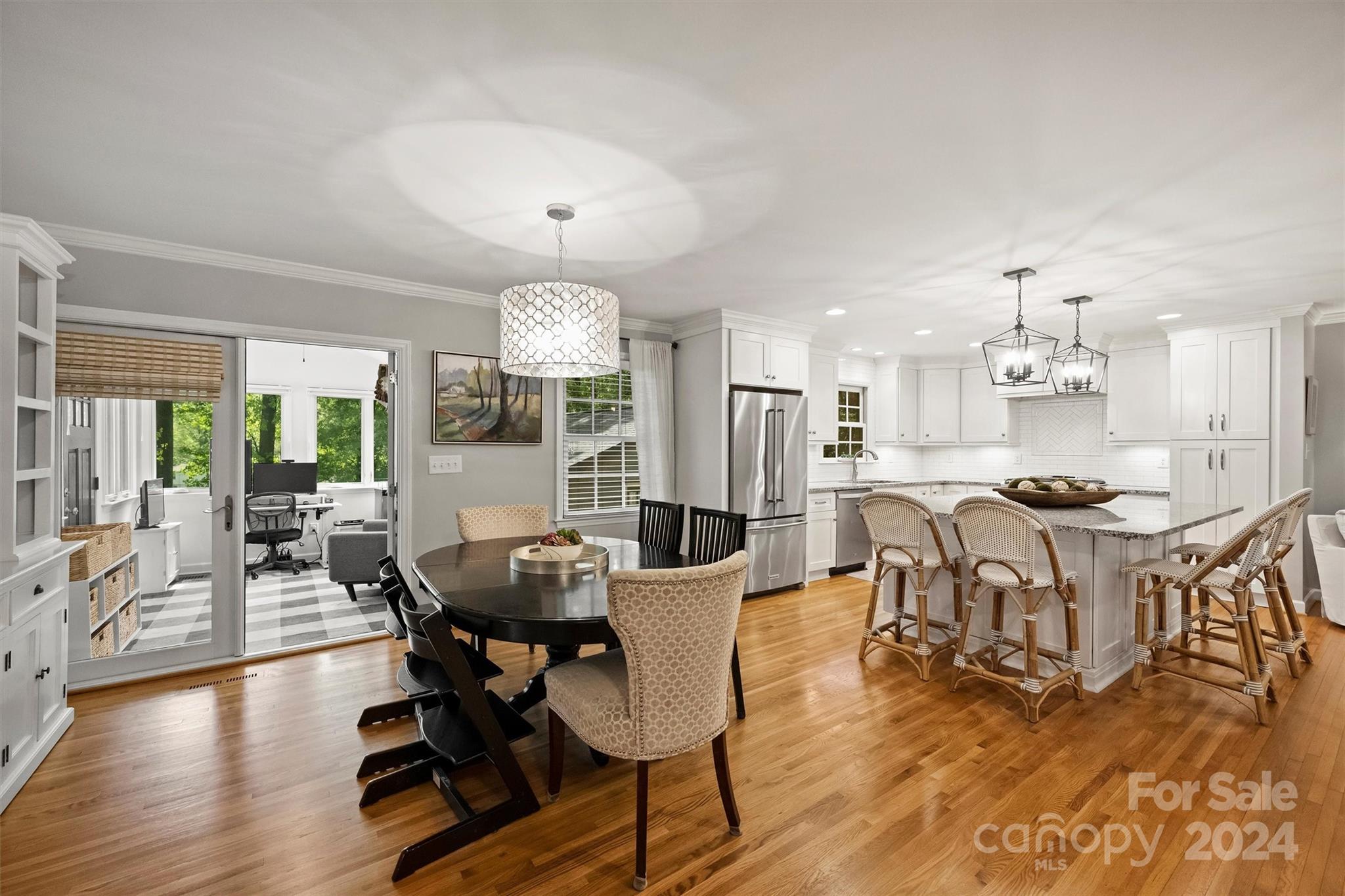 3820 Sulkirk Road Charlotte, NC 28210 - Photo 12 of 48 a view of a dining room with furniture and wooden floor