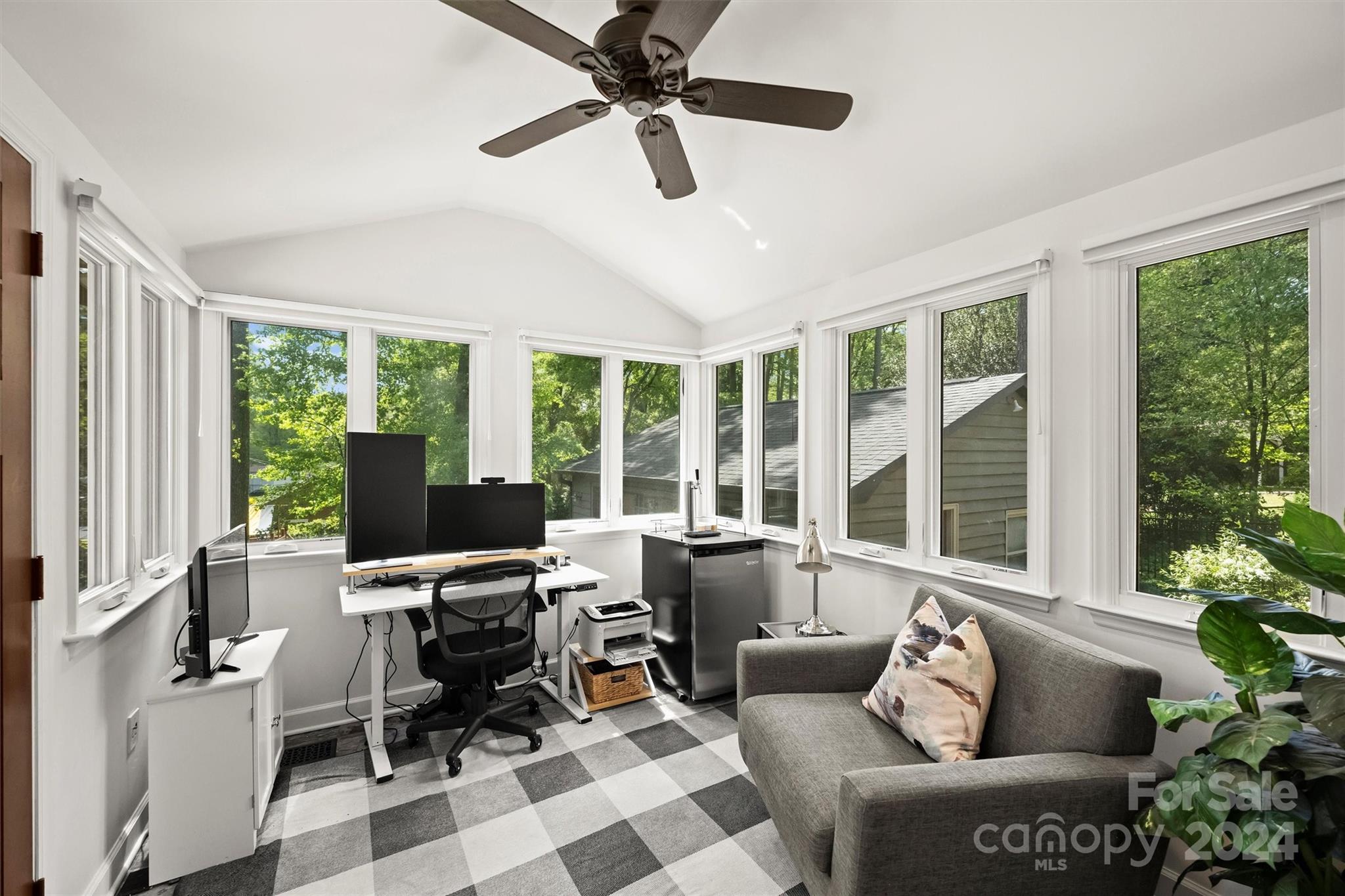 3820 Sulkirk Road Charlotte, NC 28210 - Photo 20 of 48 a living room with furniture and a floor to ceiling window