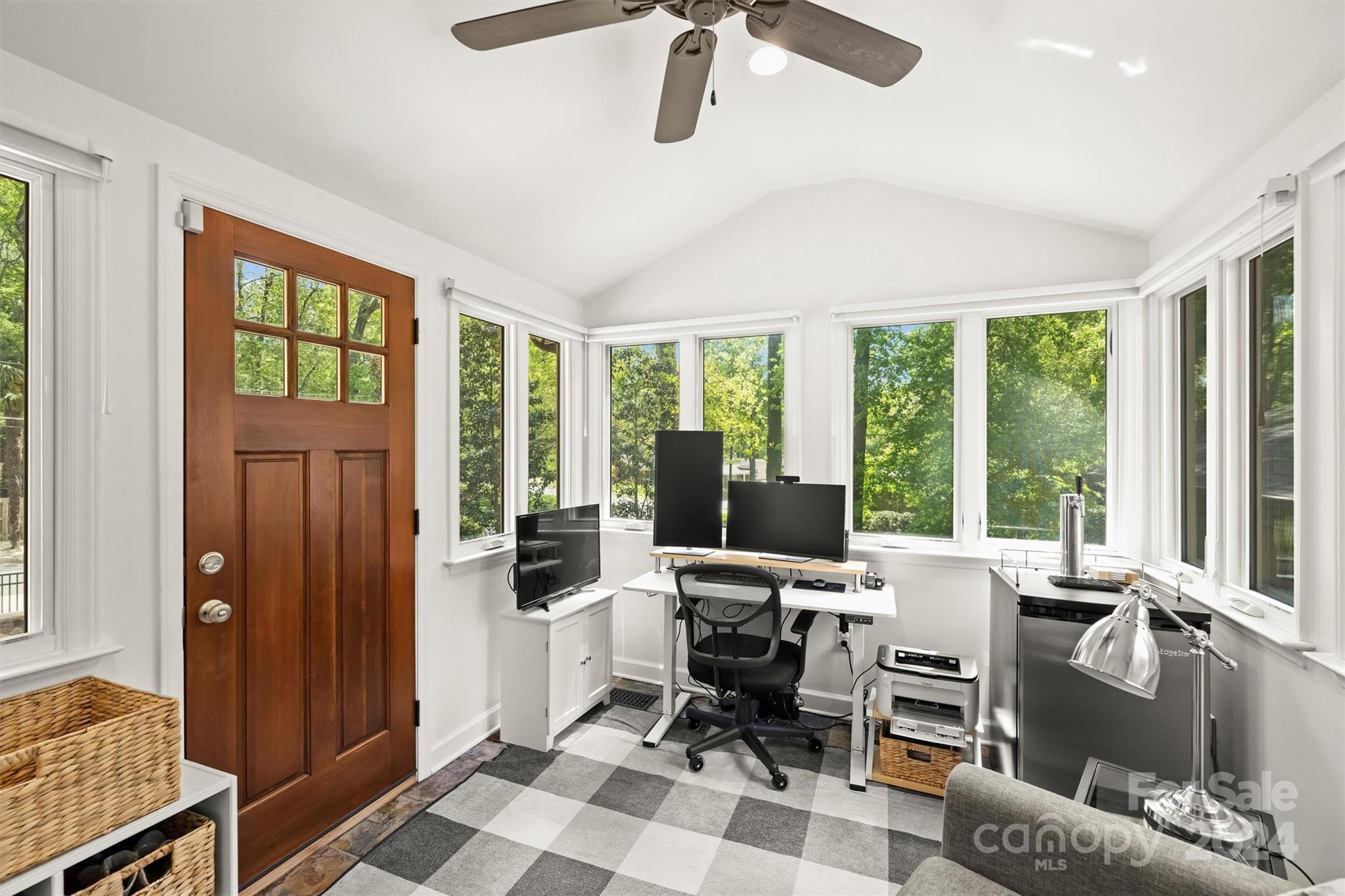 3820 Sulkirk Road Charlotte, NC 28210 - Photo 21 of 48 a view of a livingroom with workspace and windows