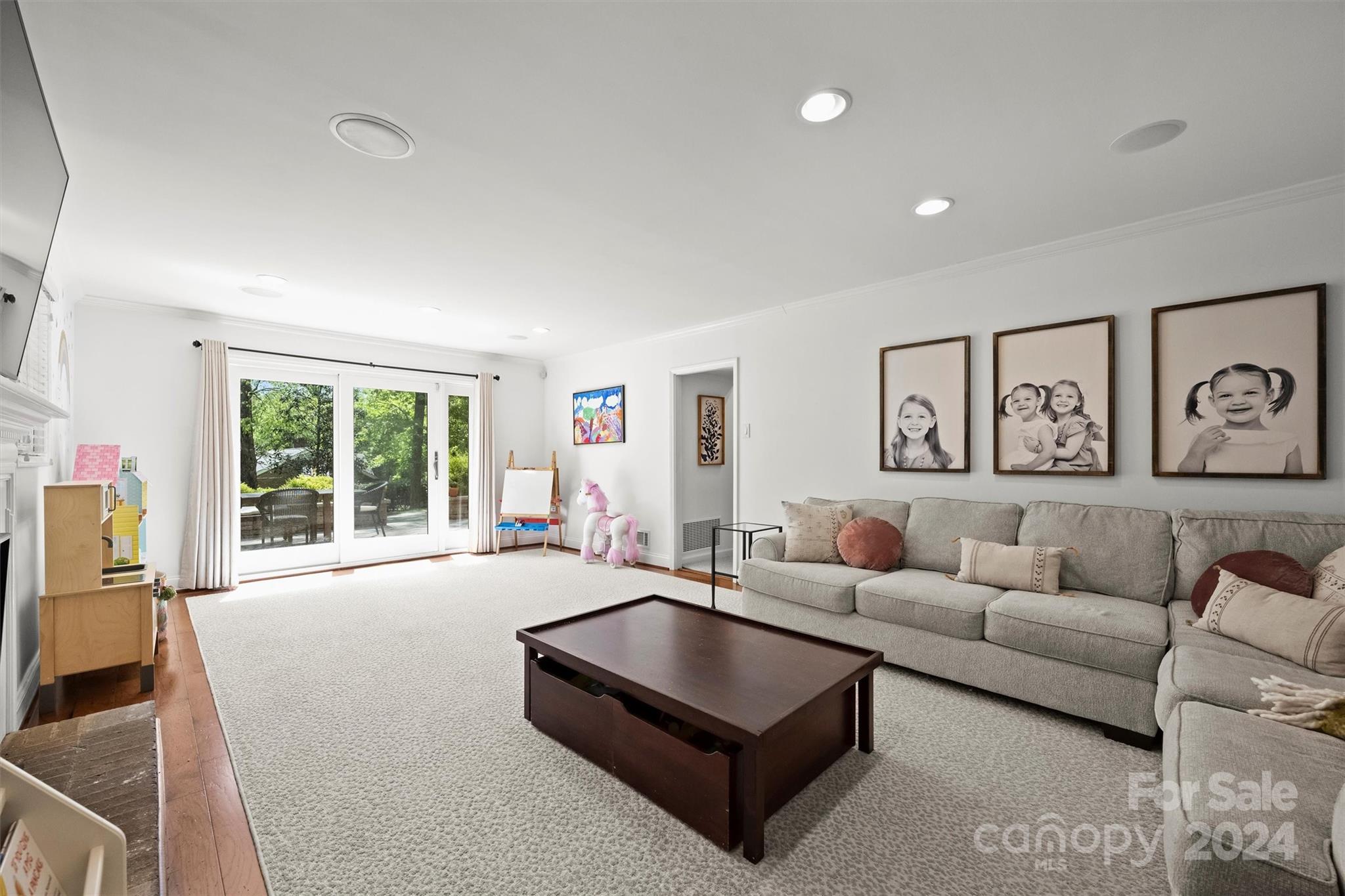 3820 Sulkirk Road Charlotte, NC 28210 - Photo 24 of 48 a living room with furniture and a large window