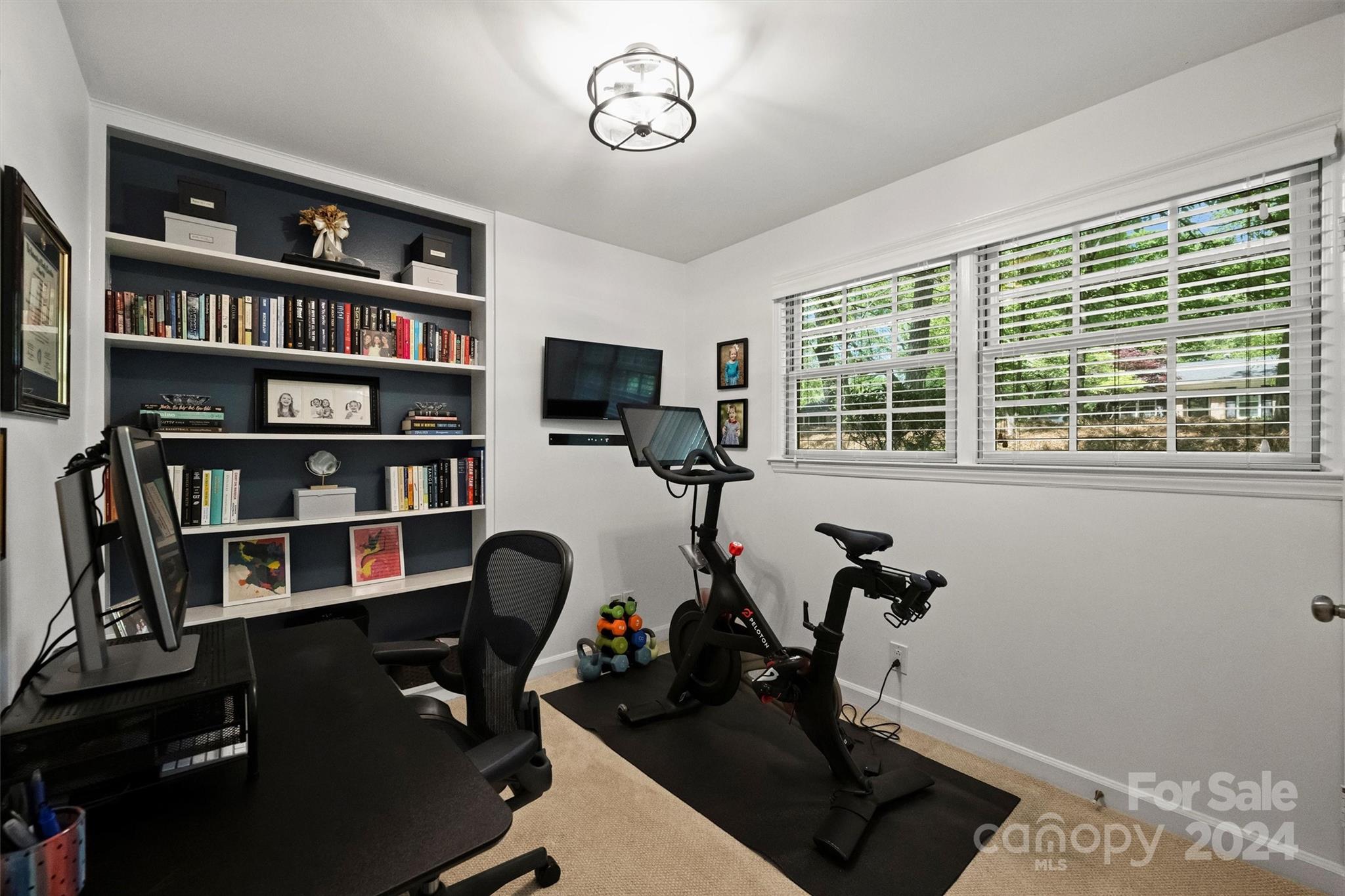 3820 Sulkirk Road Charlotte, NC 28210 - Photo 25 of 48 a view of a workspace with furniture and a window