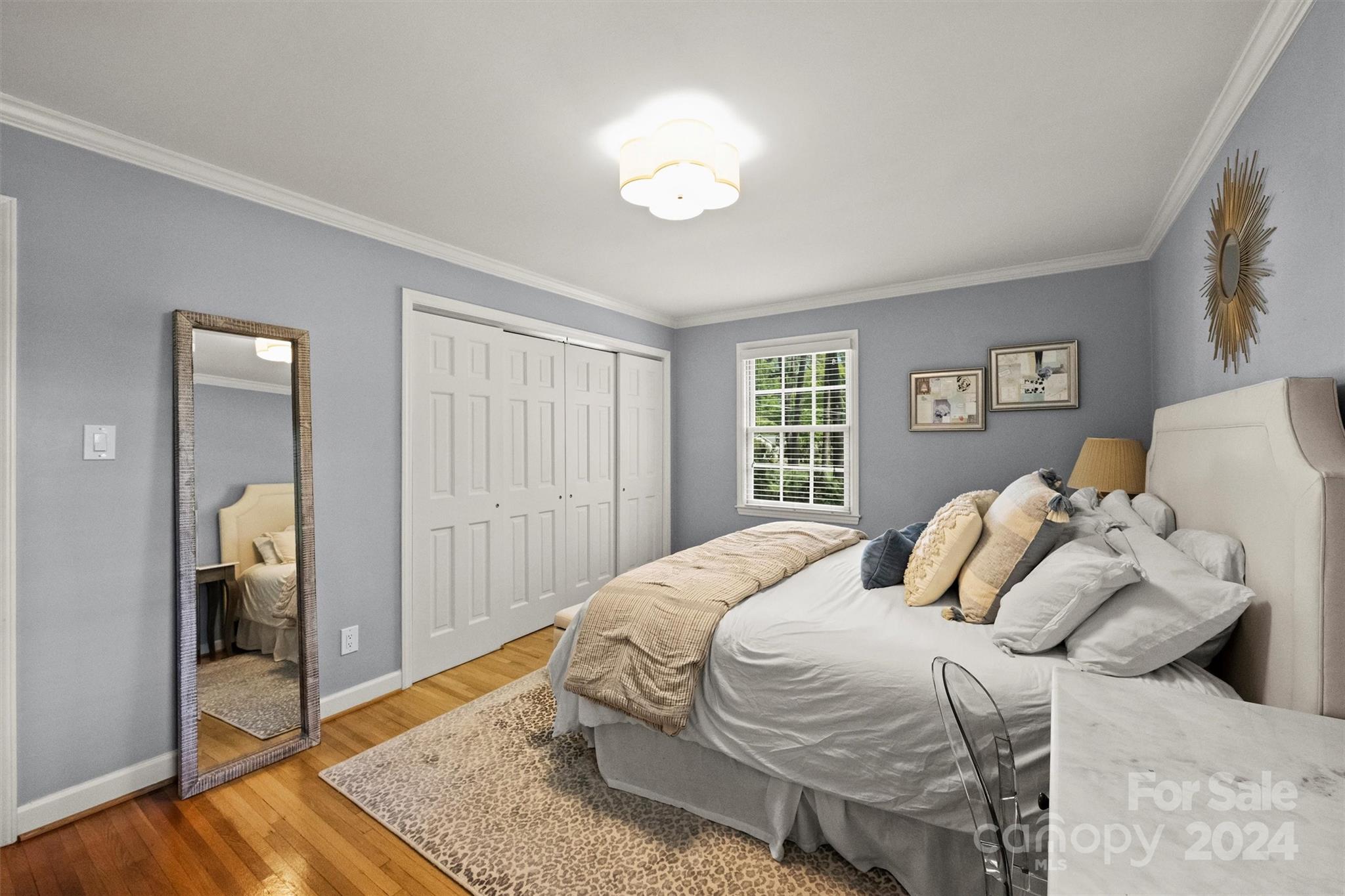 3820 Sulkirk Road Charlotte, NC 28210 - Photo 28 of 48 a bedroom with a bed and a mirror