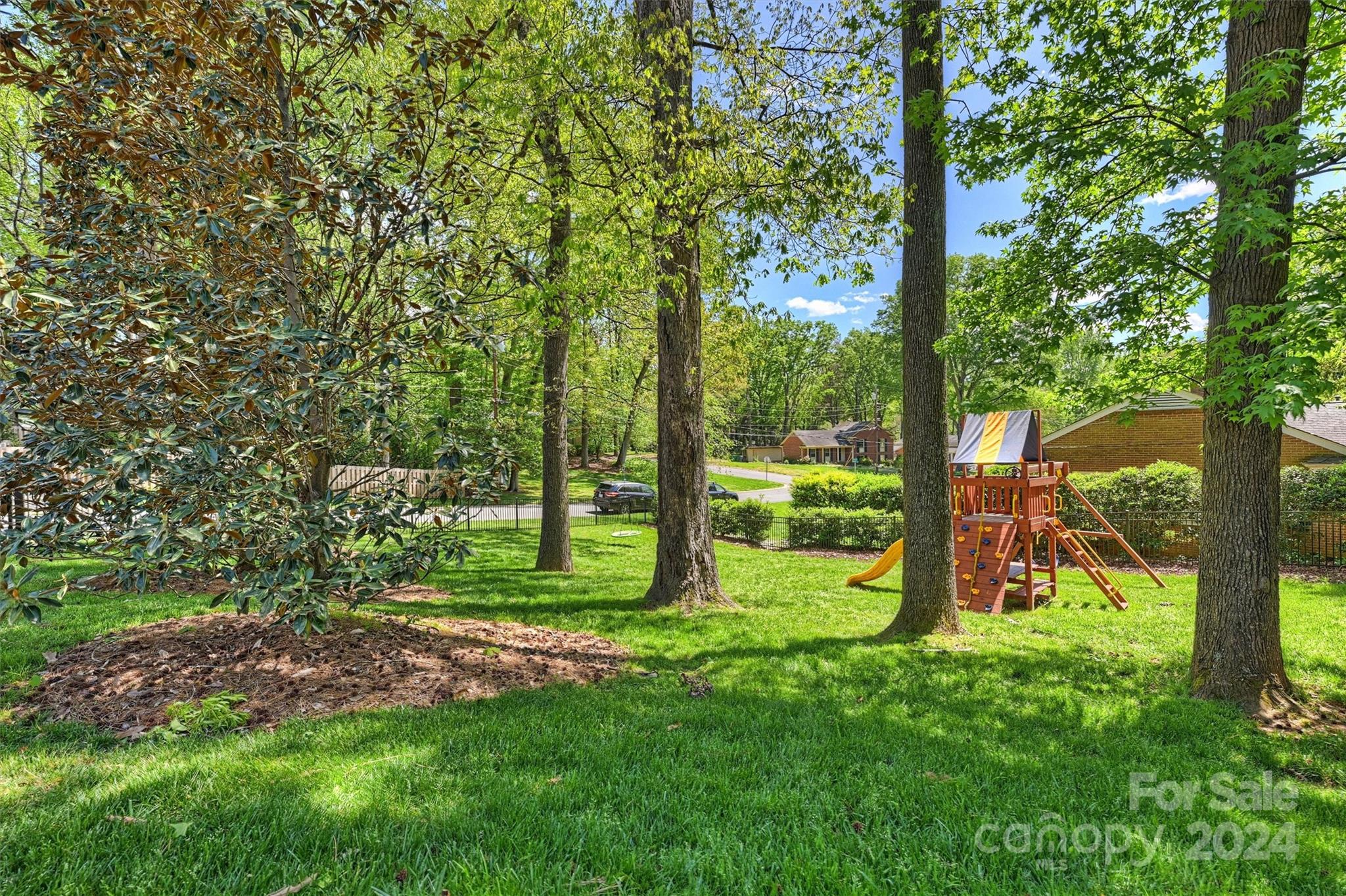 3820 Sulkirk Road Charlotte, NC 28210 - Photo 45 of 48 a view of a backyard with a tree