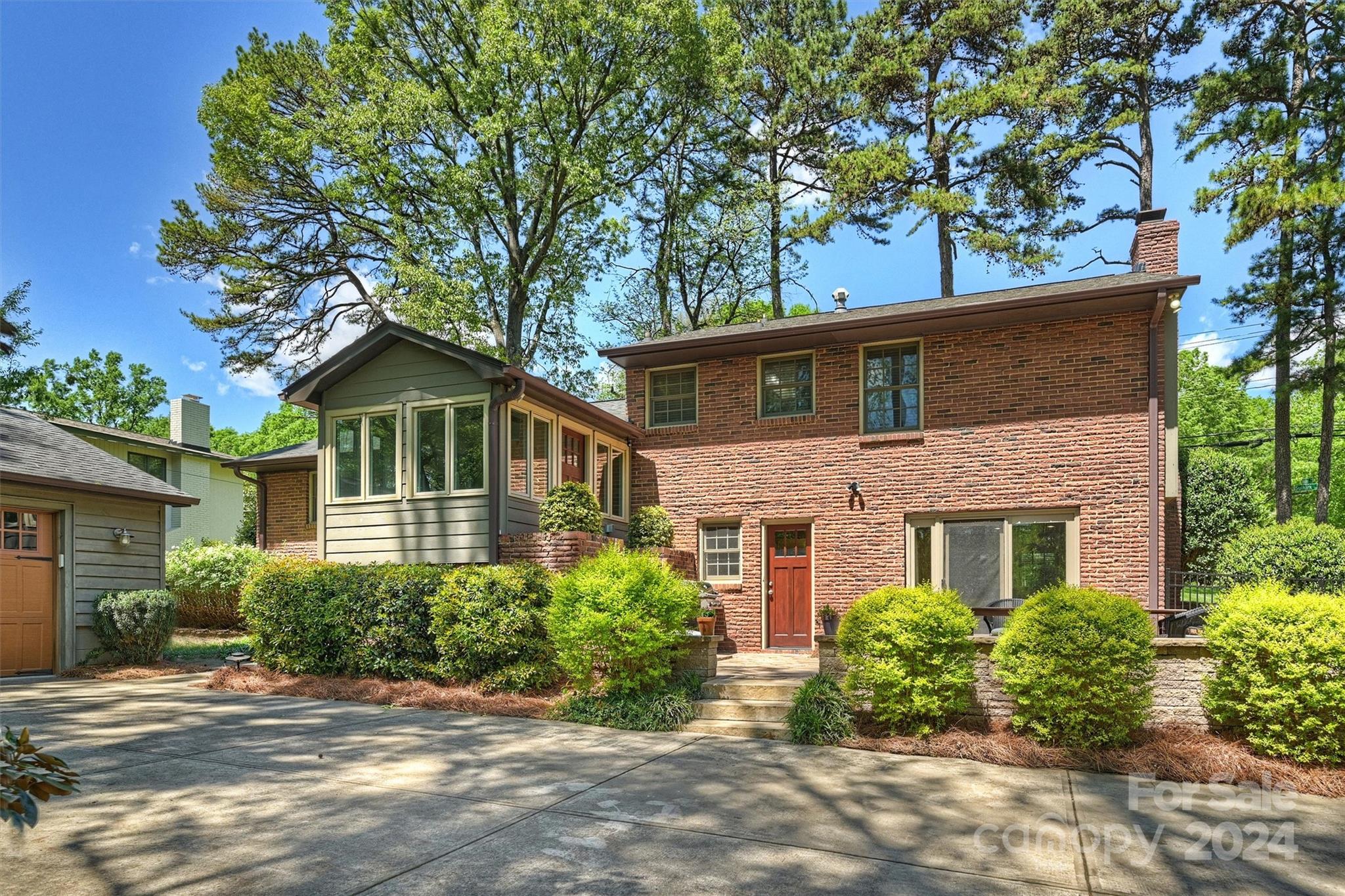3820 Sulkirk Road Charlotte, NC 28210 - Photo 46 of 48 a front view of a house with a yard