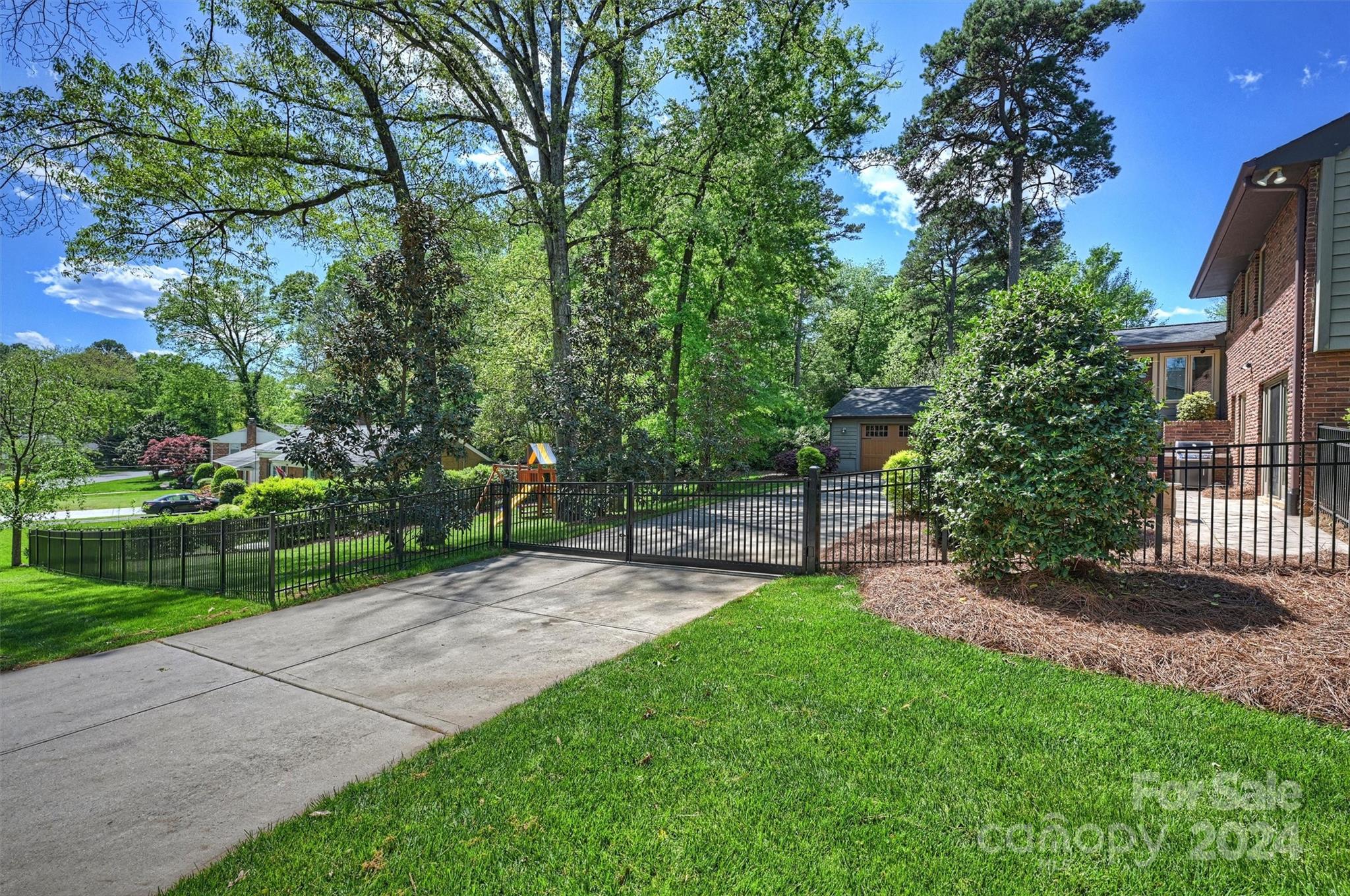 3820 Sulkirk Road Charlotte, NC 28210 - Photo 47 of 48 a view of a patio with a yard