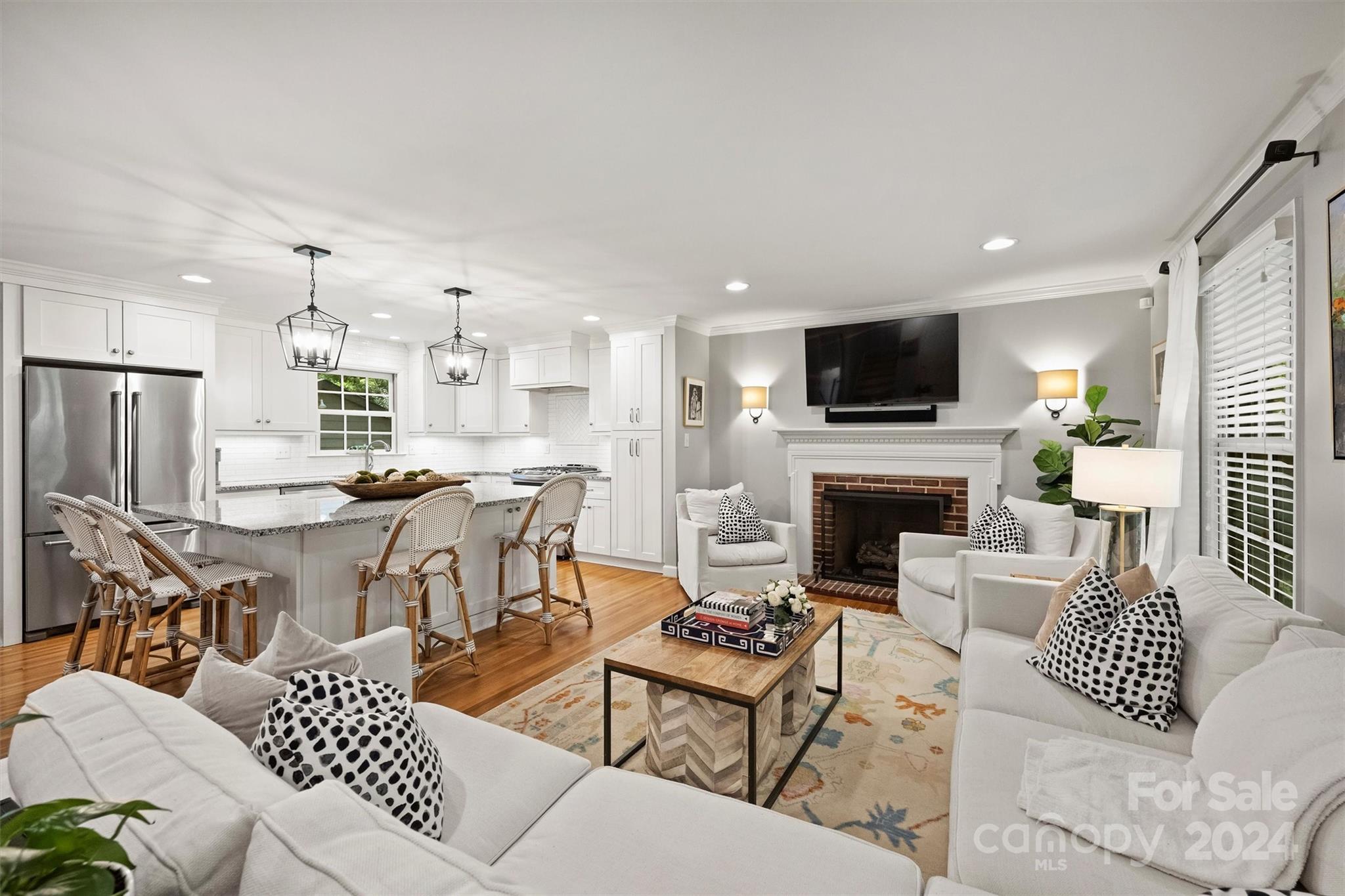 3820 Sulkirk Road Charlotte, NC 28210 - Photo 5 of 48 a living room with fireplace furniture and a flat screen tv
