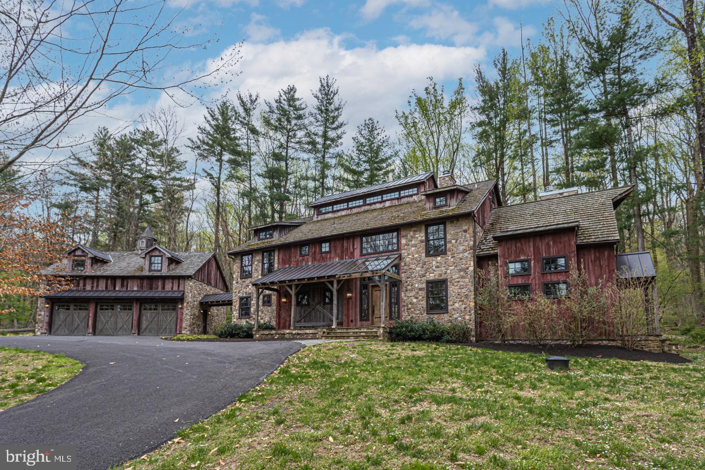 340 Thompson Mill Road New Hope, PA 18938 - Photo 1 of 76 a front view of a house with a garden