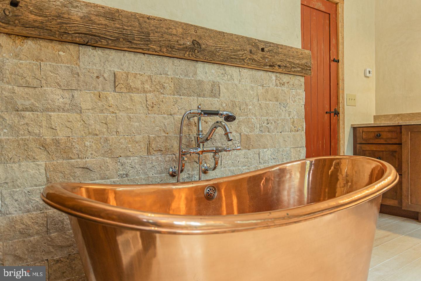 340 Thompson Mill Road New Hope, PA 18938 - Photo 30 of 76 a white bath tub sitting in a bathroom