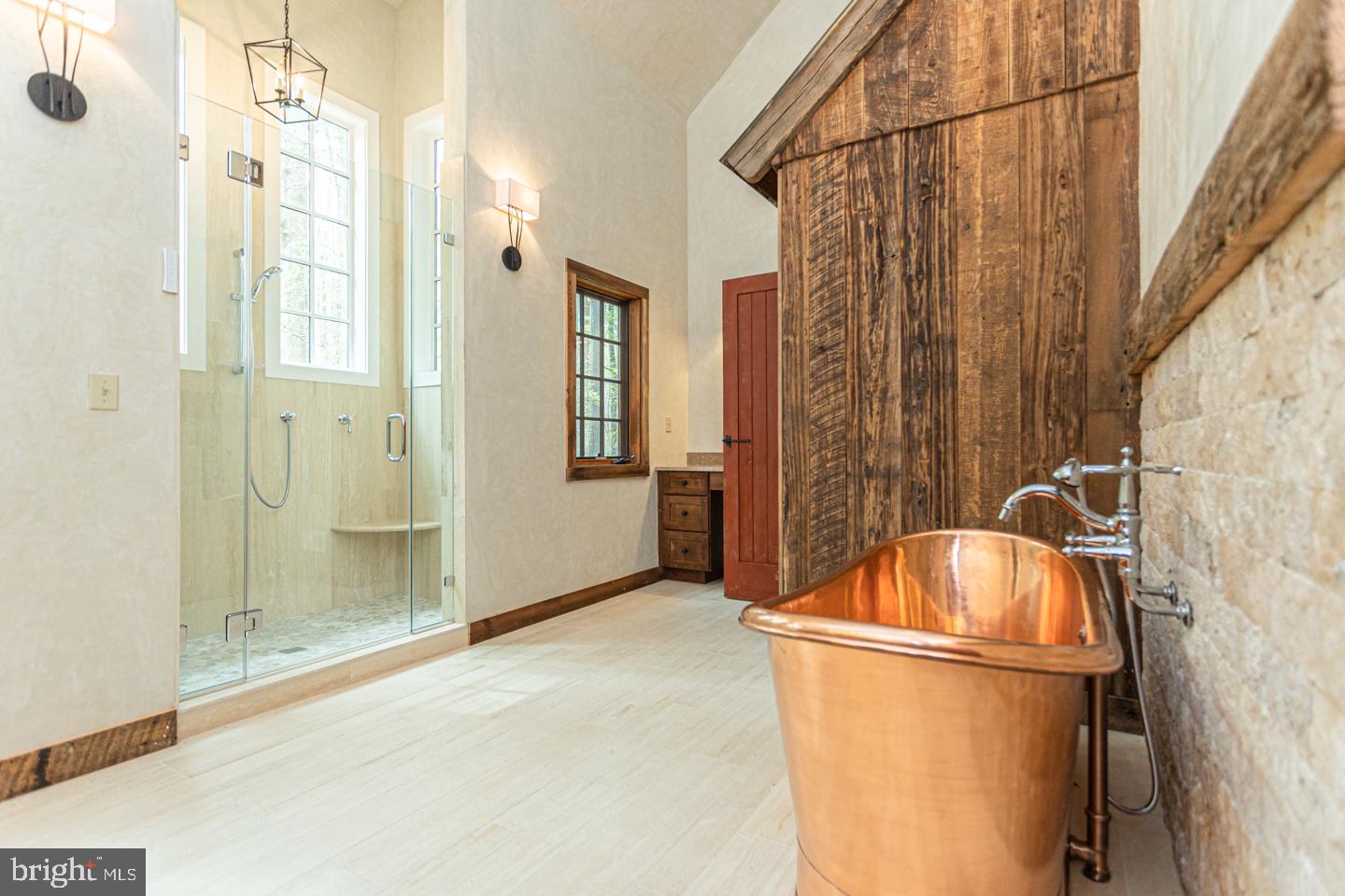 340 Thompson Mill Road New Hope, PA 18938 - Photo 31 of 76 a bathroom with a tub and shower