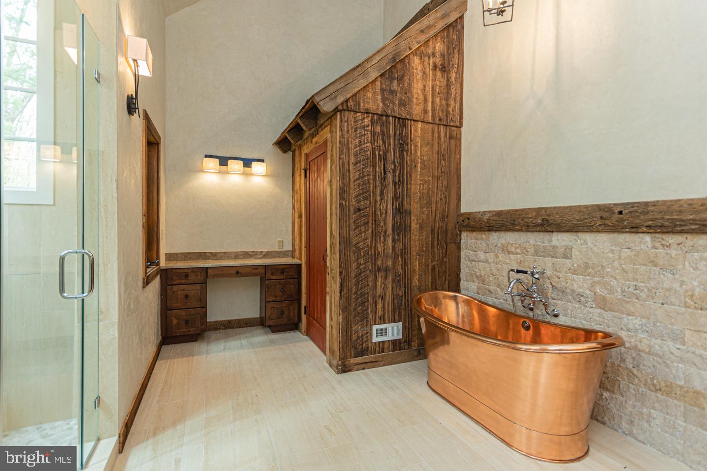 340 Thompson Mill Road New Hope, PA 18938 - Photo 32 of 76 a bathroom with a bathtub and shower