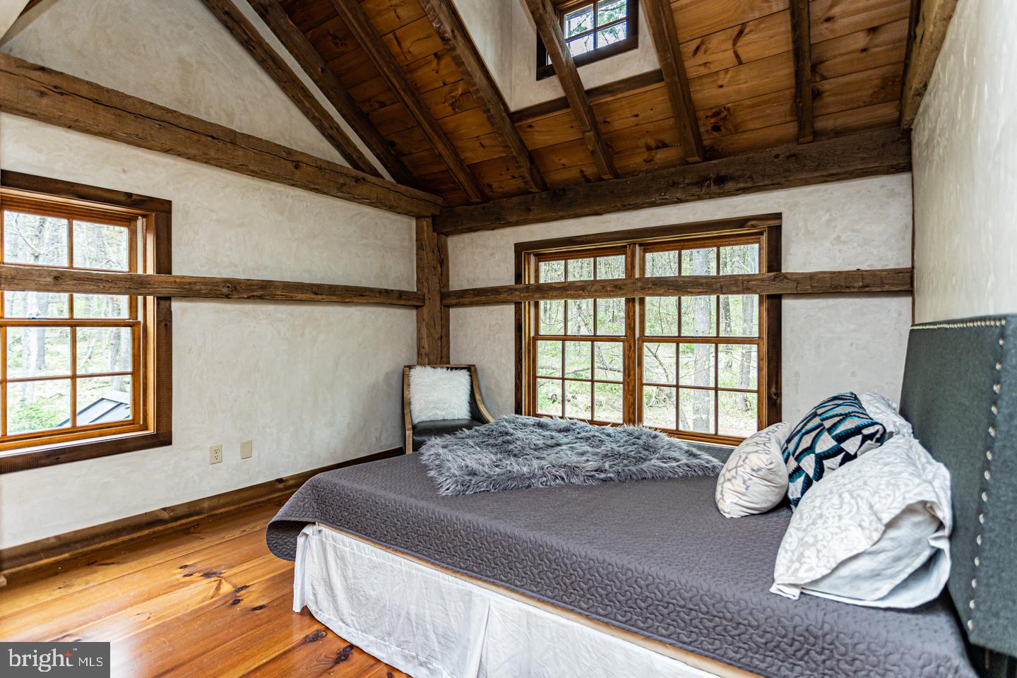 340 Thompson Mill Road New Hope, PA 18938 - Photo 44 of 76 a bed sitting in a bedroom next to a window