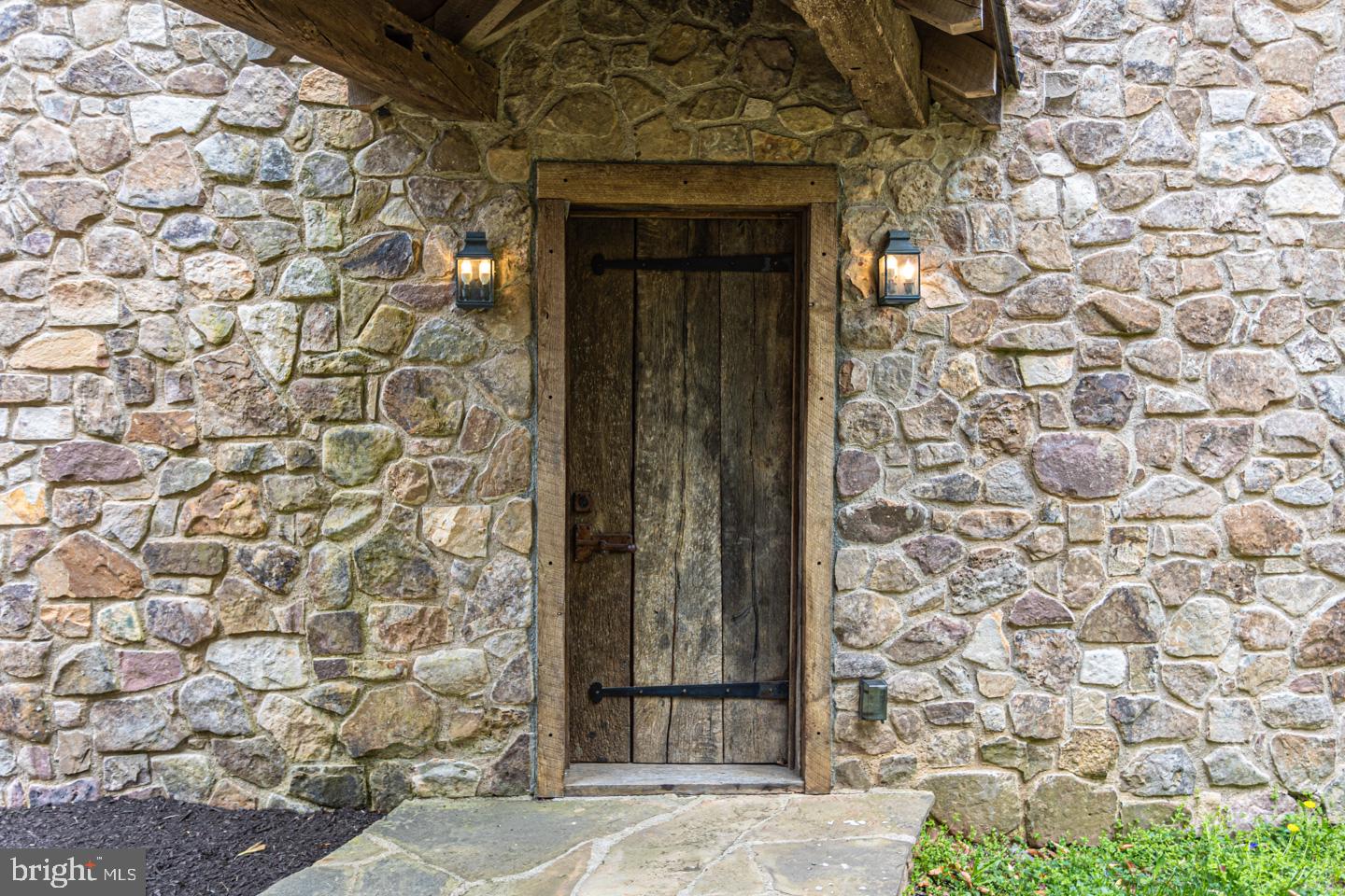 340 Thompson Mill Road New Hope, PA 18938 - Photo 62 of 76 a front view of a house with a door