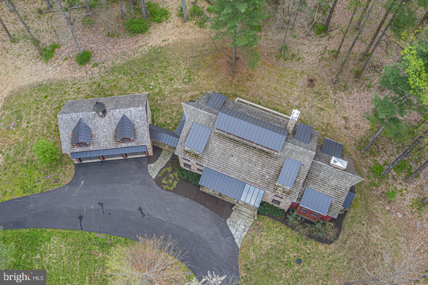 340 Thompson Mill Road New Hope, PA 18938 - Photo 69 of 76 an aerial view of a house with a yard and a garden