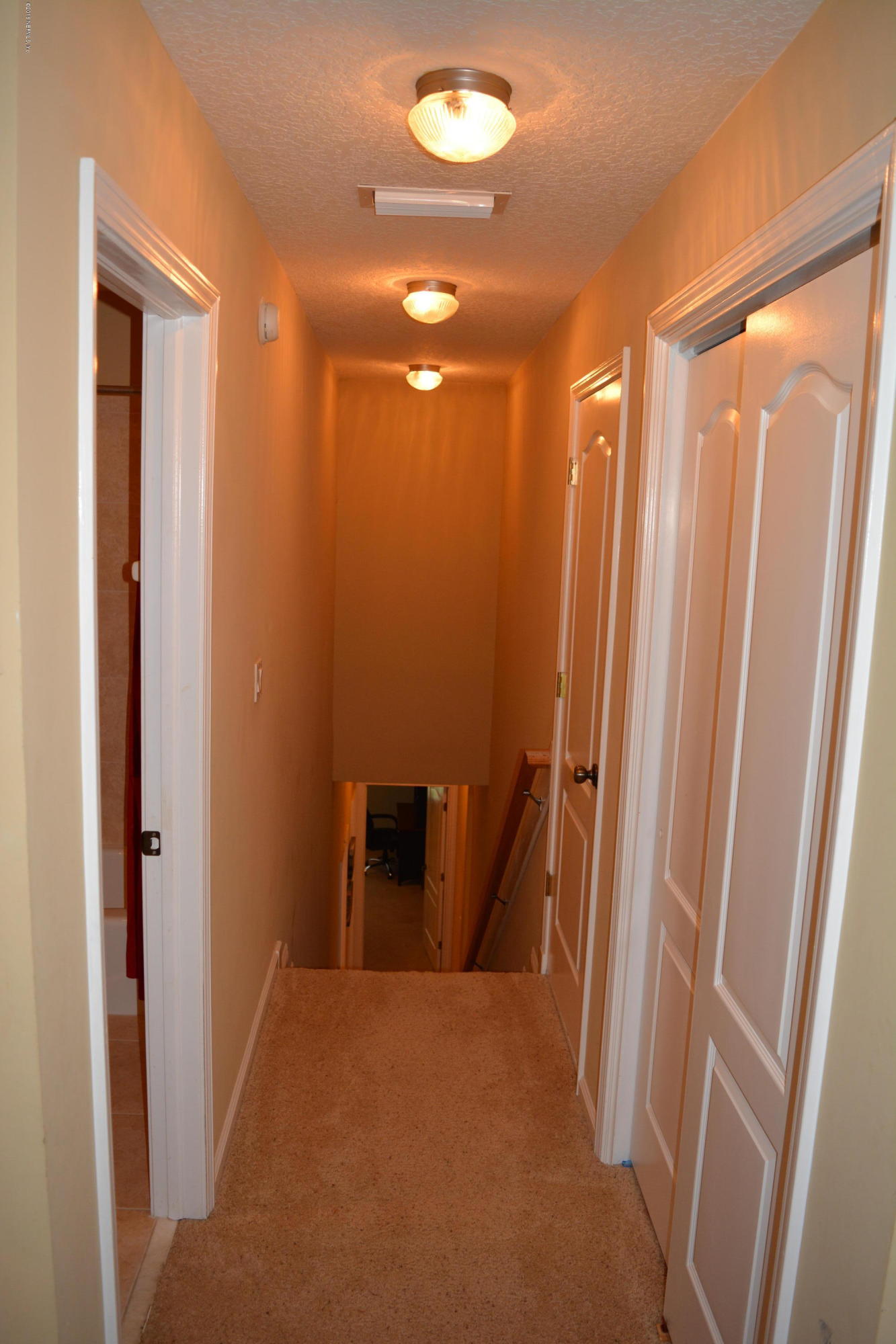 1900 Summit Ridge Road Fleming Island, FL 32003 - Photo 41 of 72 Upstairs Hallway & Storage