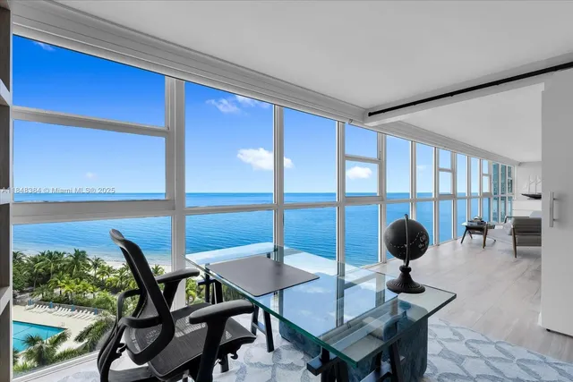 a view of a livingroom with furniture and window