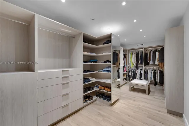 a view of a livingroom with furniture and closet