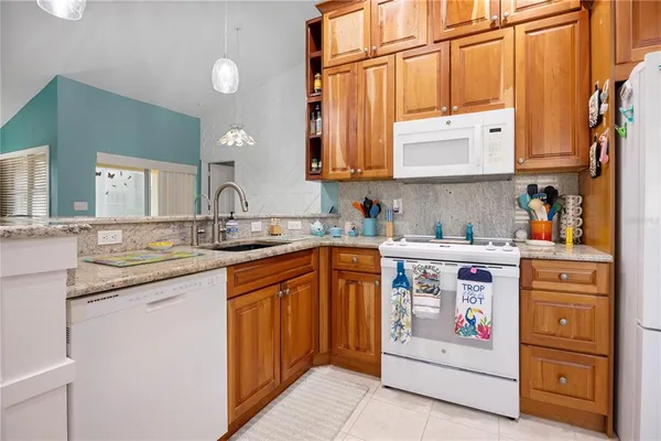 a bathroom with a tub and a sink