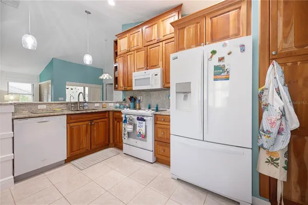 a view of a bathroom with a tub and a window