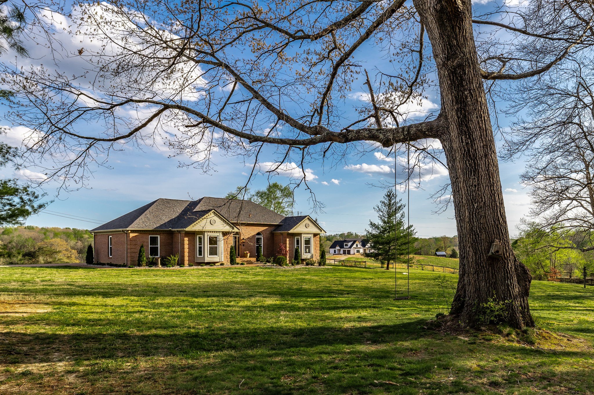 1075 Fannie Nicholson Road Chapmansboro, TN 37035 - Photo 13 of 100 a front view of a house with a yard