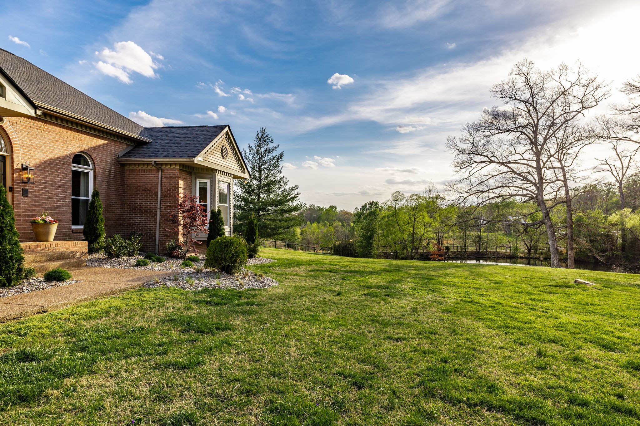 1075 Fannie Nicholson Road Chapmansboro, TN 37035 - Photo 16 of 100 a view of a patio with a yard