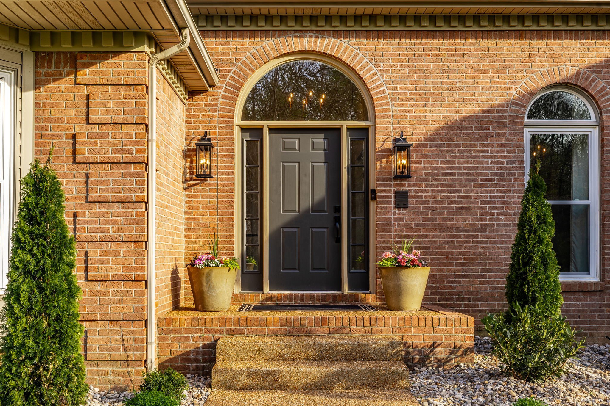 1075 Fannie Nicholson Road Chapmansboro, TN 37035 - Photo 17 of 100 a front view of a house with a garden