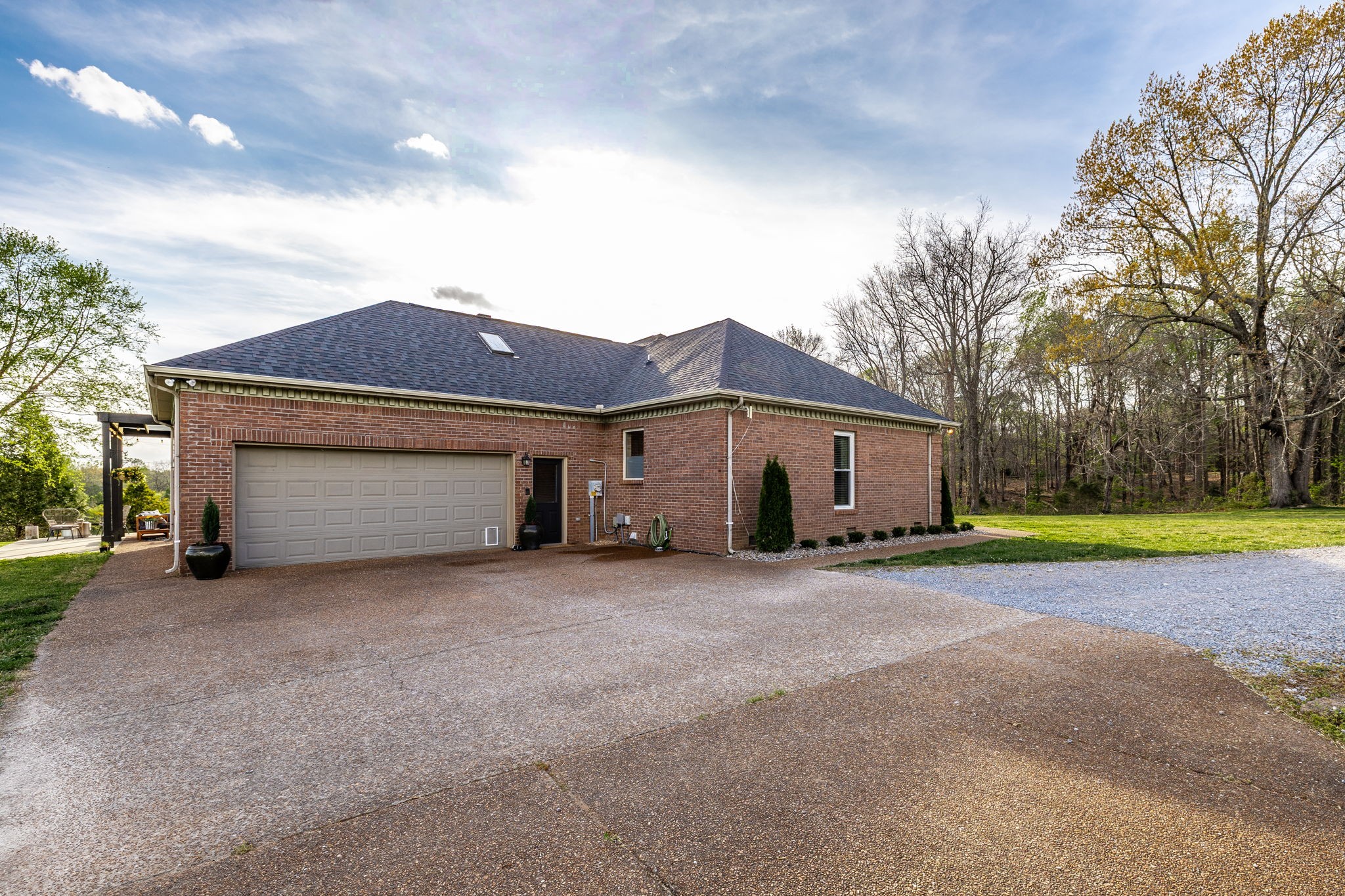 1075 Fannie Nicholson Road Chapmansboro, TN 37035 - Photo 18 of 100 a big house with a big yard and large trees