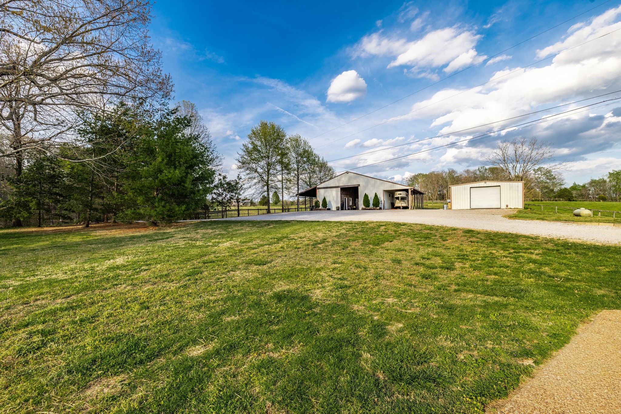 1075 Fannie Nicholson Road Chapmansboro, TN 37035 - Photo 20 of 100 a view of a swimming pool with an outdoor space and seating area