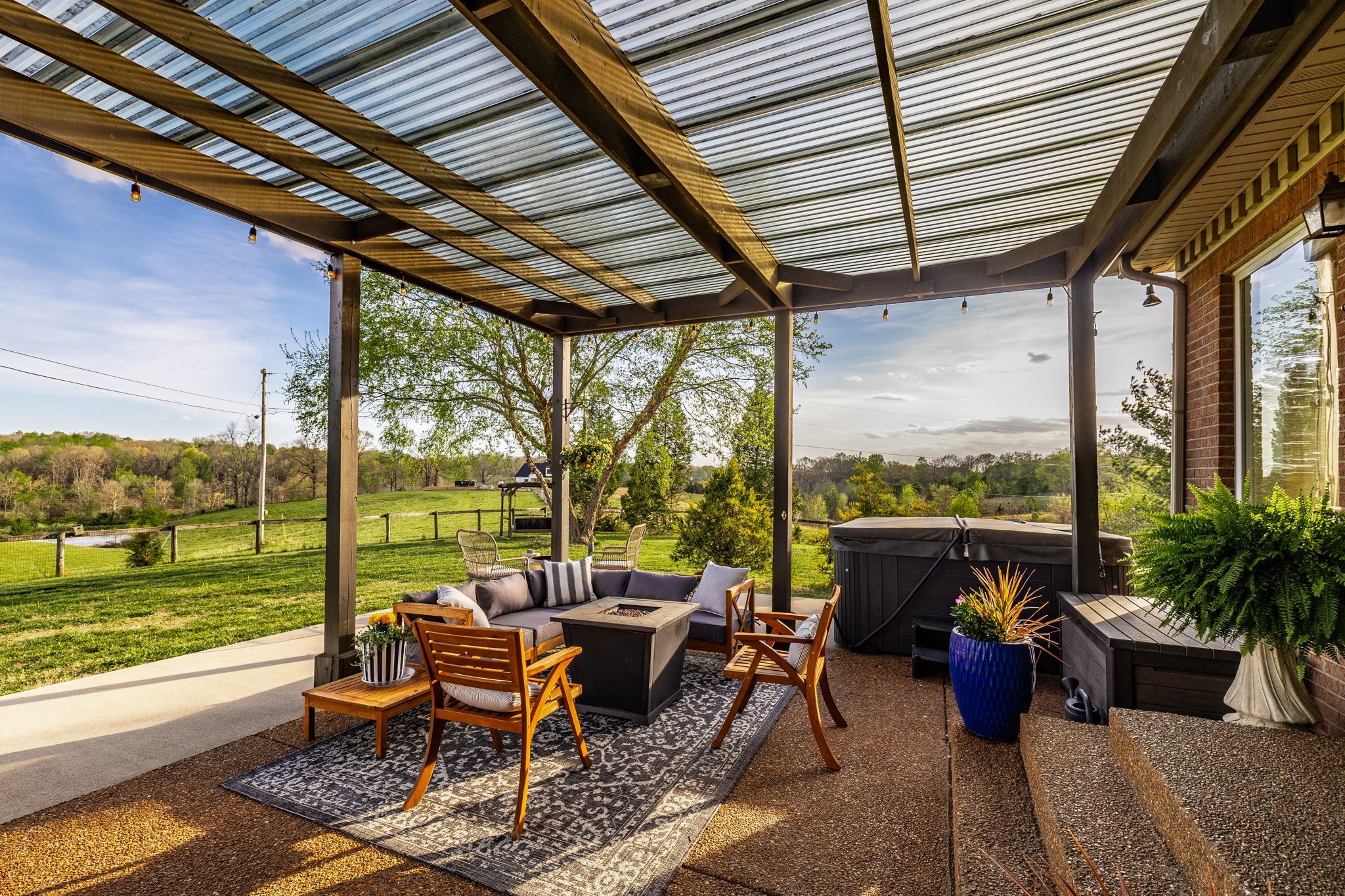 1075 Fannie Nicholson Road Chapmansboro, TN 37035 - Photo 23 of 100 a building outdoor space with furniture and garden view