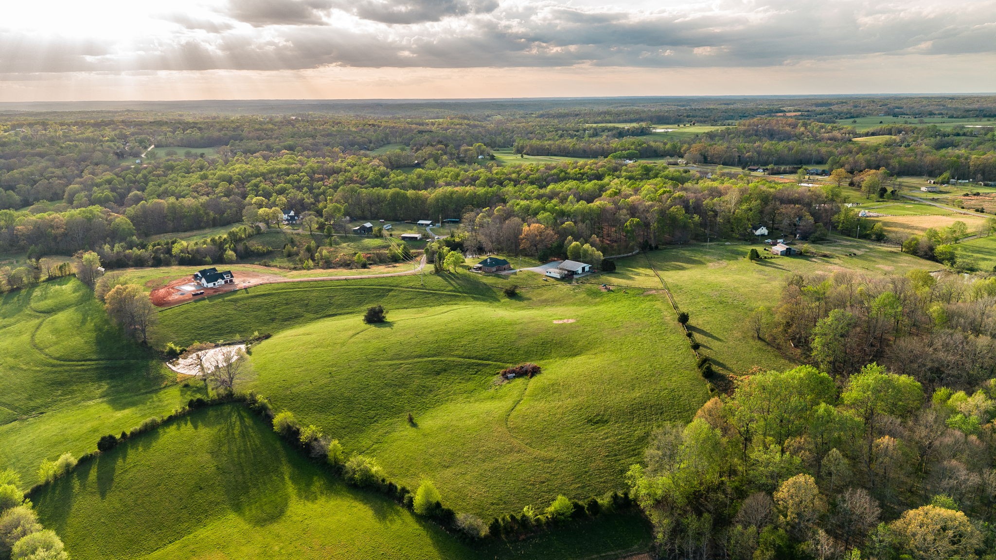 1075 Fannie Nicholson Road Chapmansboro, TN 37035 - Photo 4 of 100 an aerial view of a residential houses with outdoor space