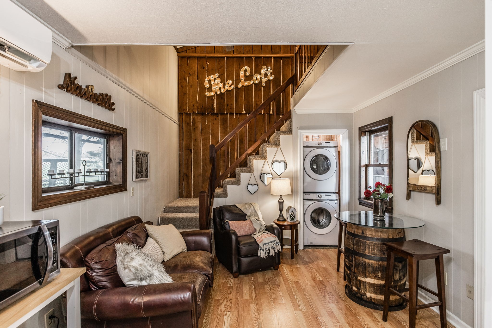 1075 Fannie Nicholson Road Chapmansboro, TN 37035 - Photo 50 of 100 a living room with furniture and wooden floor
