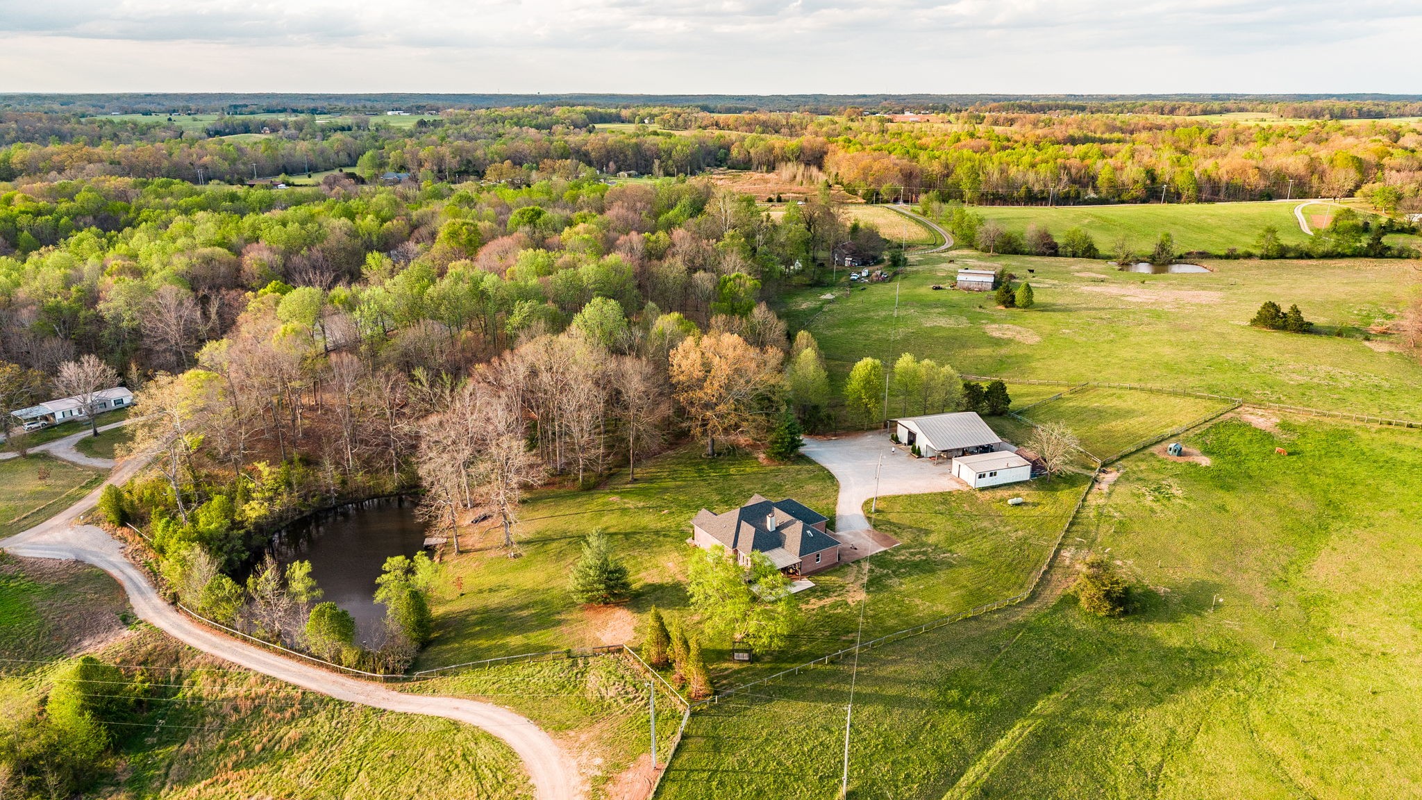 1075 Fannie Nicholson Road Chapmansboro, TN 37035 - Photo 6 of 100 a view of a swimming pool with a yard