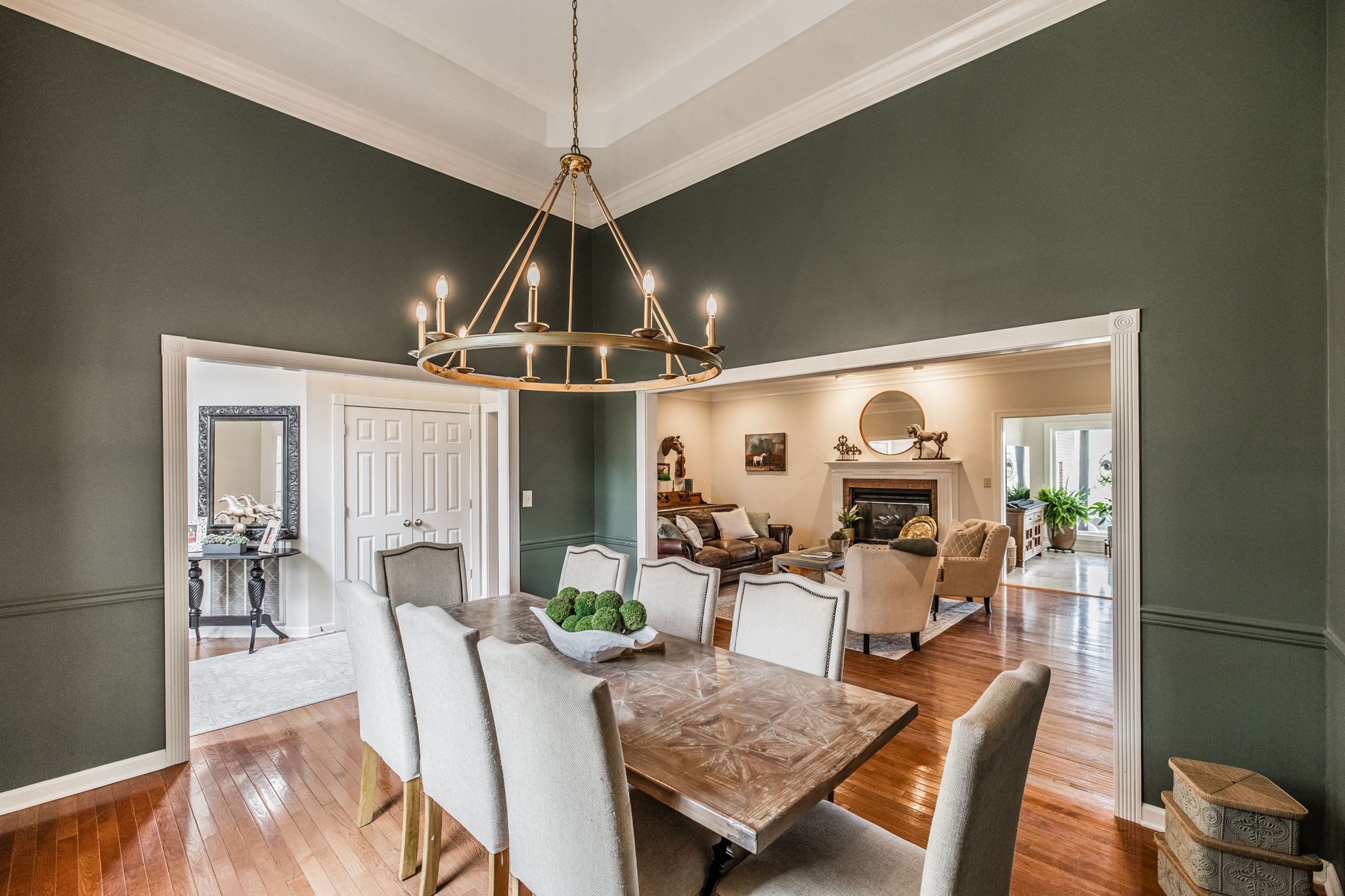 1075 Fannie Nicholson Road Chapmansboro, TN 37035 - Photo 67 of 100 a view of a dining room with furniture wooden floor and chandelier