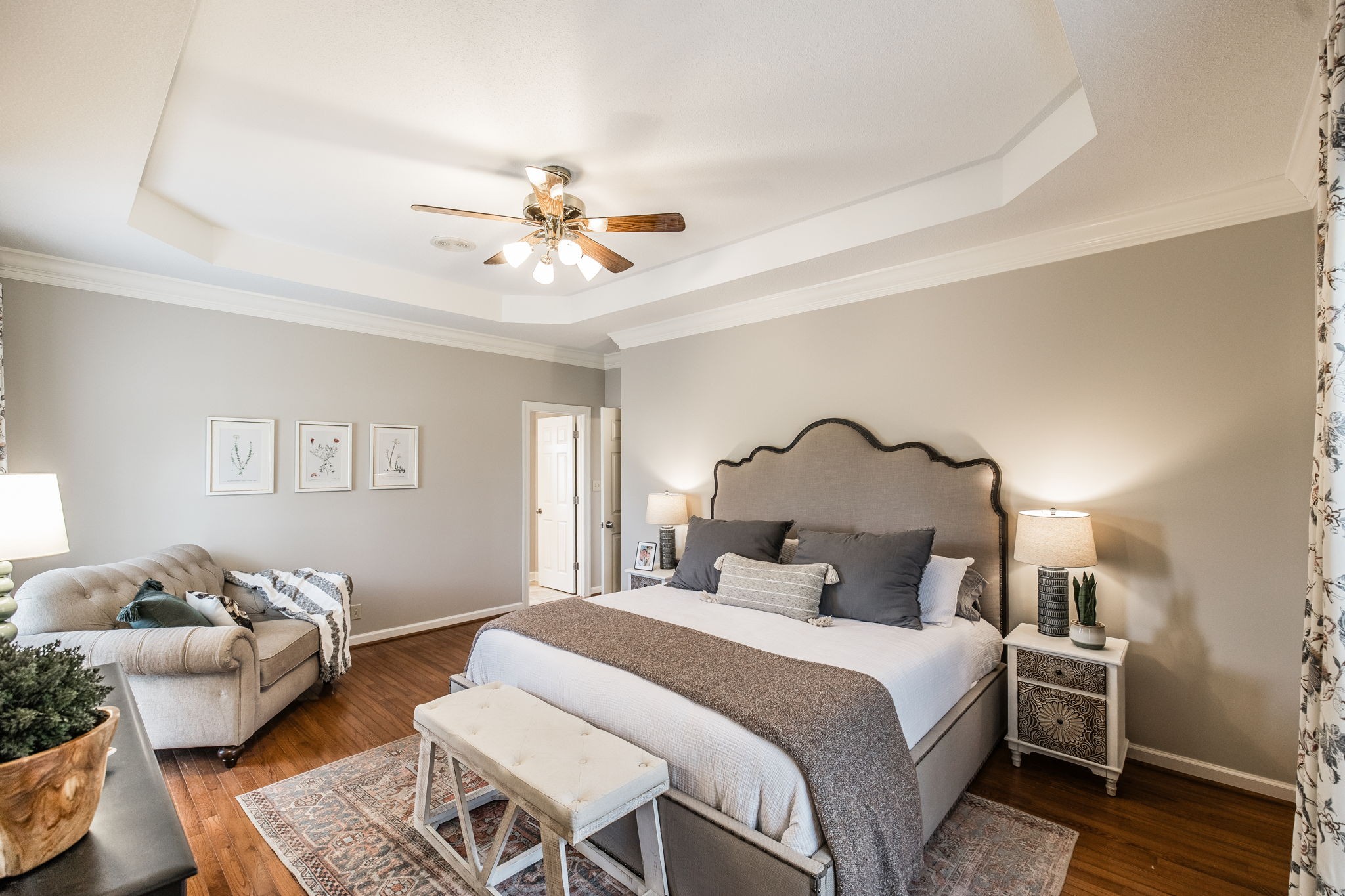 1075 Fannie Nicholson Road Chapmansboro, TN 37035 - Photo 79 of 100 a bedroom with a bed and a chandelier