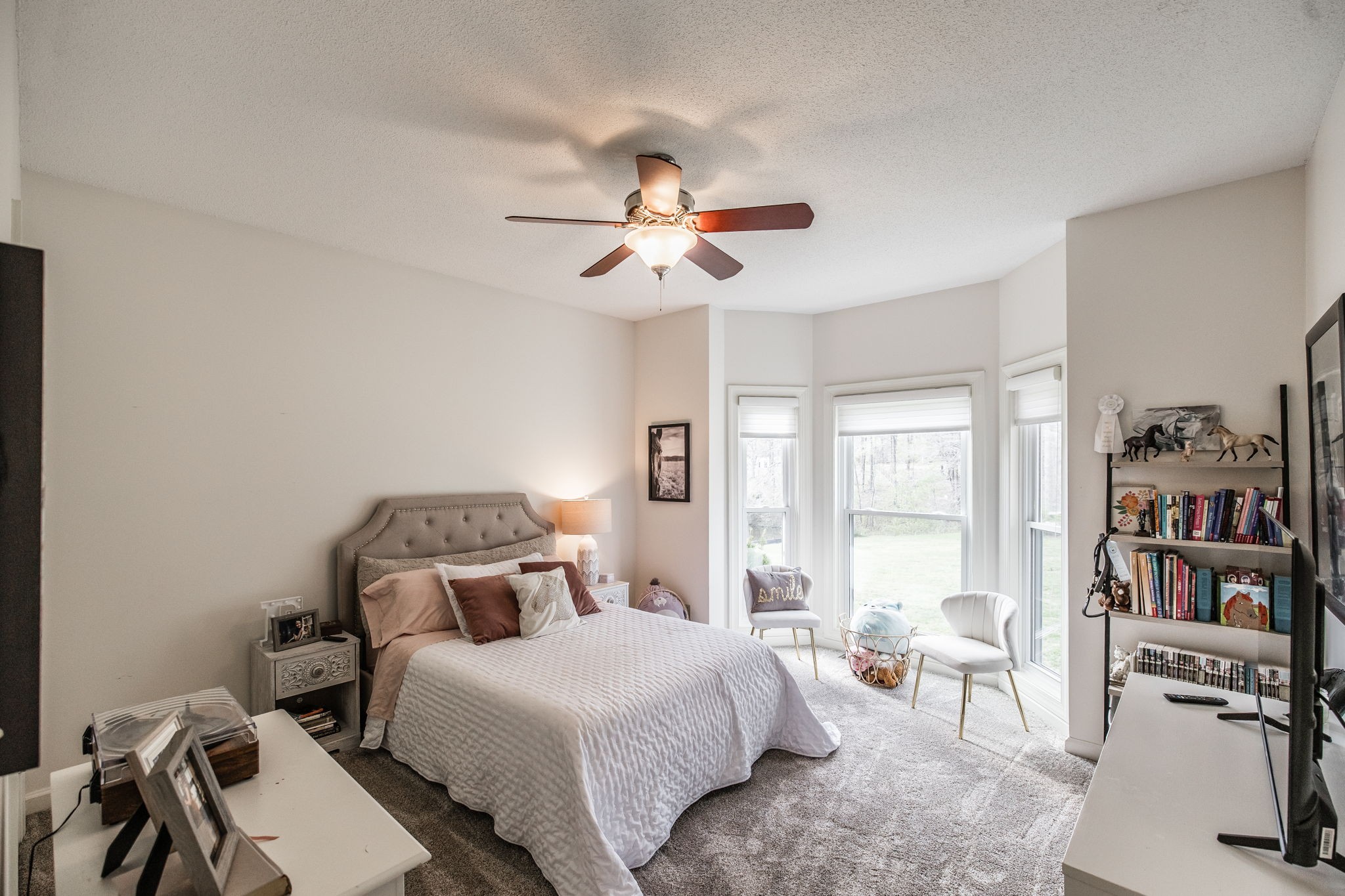 1075 Fannie Nicholson Road Chapmansboro, TN 37035 - Photo 86 of 100 a bedroom with a bed furniture and a chandelier