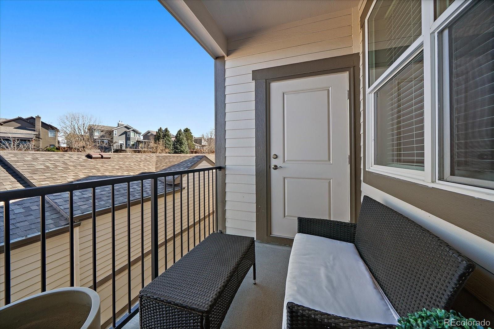 4474 Copeland Circle, Unit 203 Highlands Ranch, CO 80126 - Photo 22 of 33 a view of a balcony with furniture