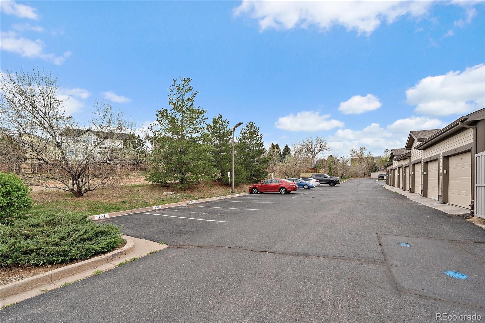 4474 Copeland Circle, Unit 203 Highlands Ranch, CO 80126 - Photo 27 of 33 a view of a street with a houses