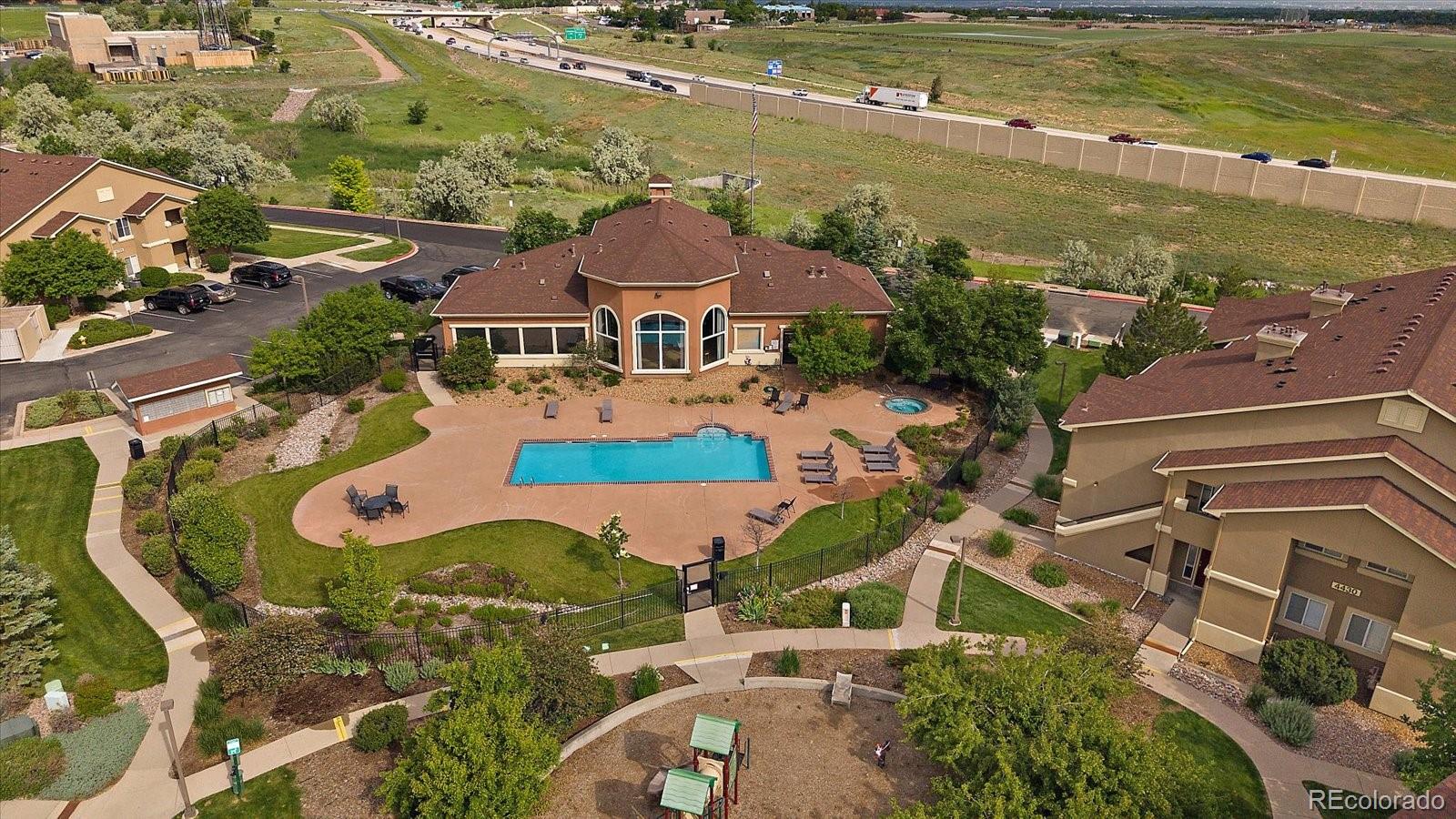 4474 Copeland Circle, Unit 203 Highlands Ranch, CO 80126 - Photo 30 of 33 an aerial view of residential houses with outdoor space and ocean view