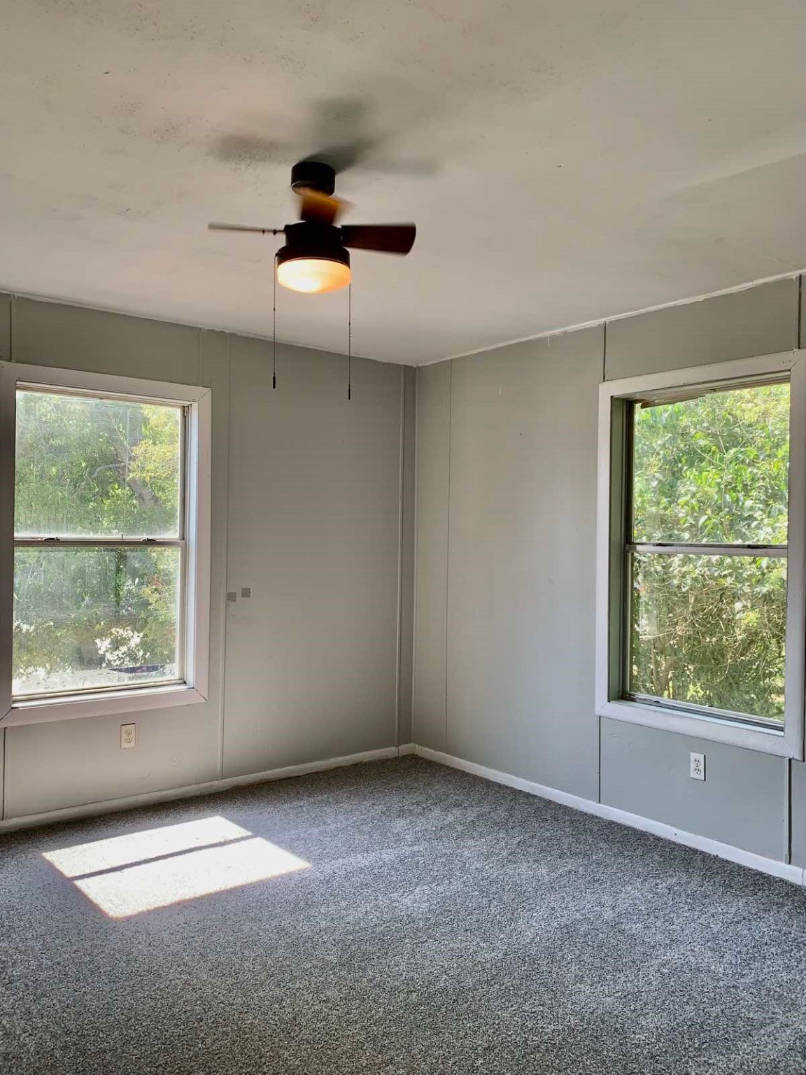 1907 Avenue C, Unit 3 Rosenberg, TX 77471 - Photo 11 of 20 an empty room with windows