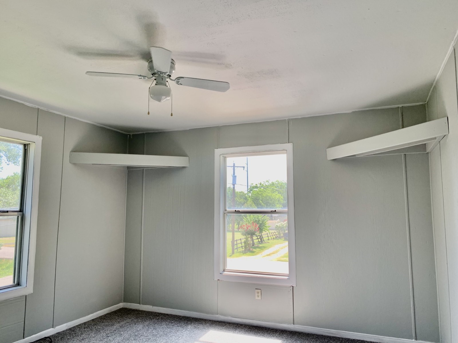 1907 Avenue C, Unit 3 Rosenberg, TX 77471 - Photo 13 of 20 an empty room with windows and closet