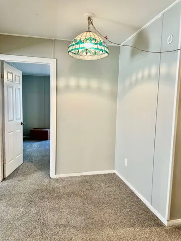 a bathroom with a toilet and a bathtub