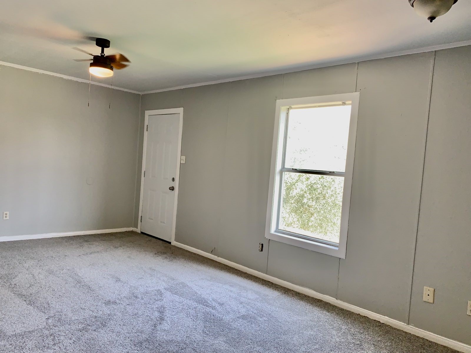 1907 Avenue C, Unit 3 Rosenberg, TX 77471 - Photo 2 of 20 a view of an empty room with a window
