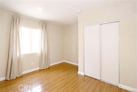 1007 Del Rey Avenue Pasadena, CA 91107 - Photo 12 of 15 a view of an empty room with wooden floor