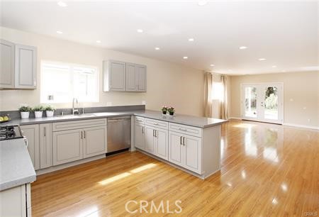 1007 Del Rey Avenue Pasadena, CA 91107 - Photo 4 of 15 a kitchen with a sink cabinets and window