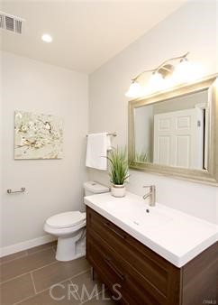 1007 Del Rey Avenue Pasadena, CA 91107 - Photo 10 of 15 a bathroom with a sink mirror and toilet