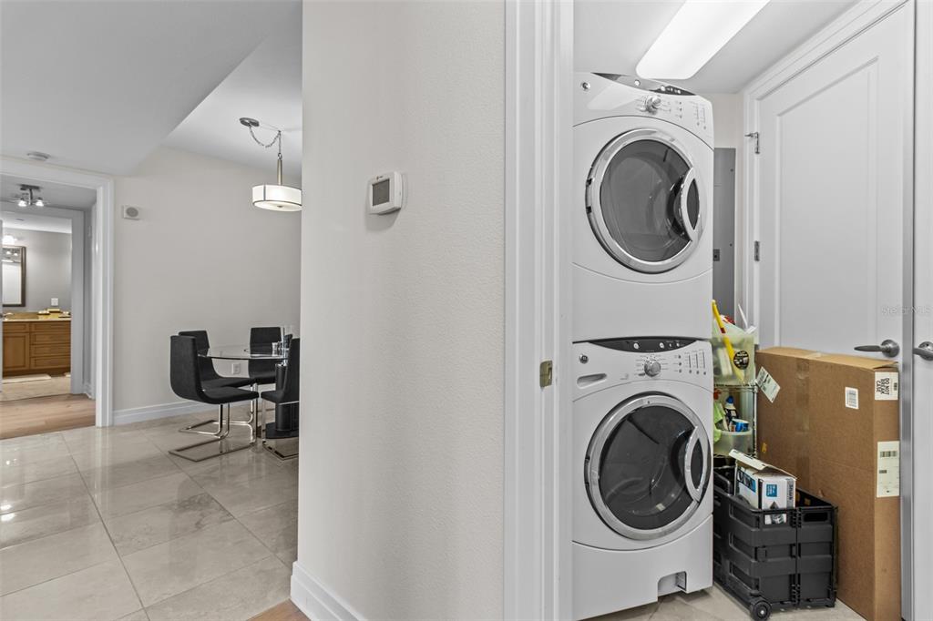 331 Cleveland Street, Unit 2102 Clearwater, FL 33755 - Photo 33 of 66 a view of a hallway with washer and dryer