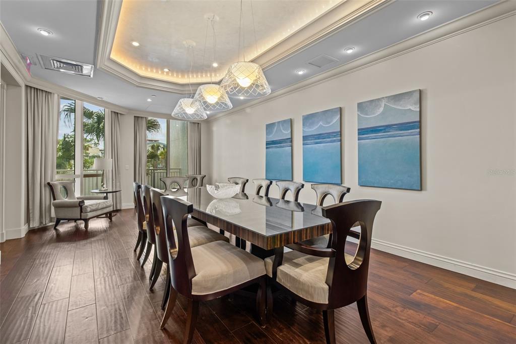 331 Cleveland Street, Unit 2102 Clearwater, FL 33755 - Photo 48 of 66 a view of a a dining room with furniture window and wooden floor