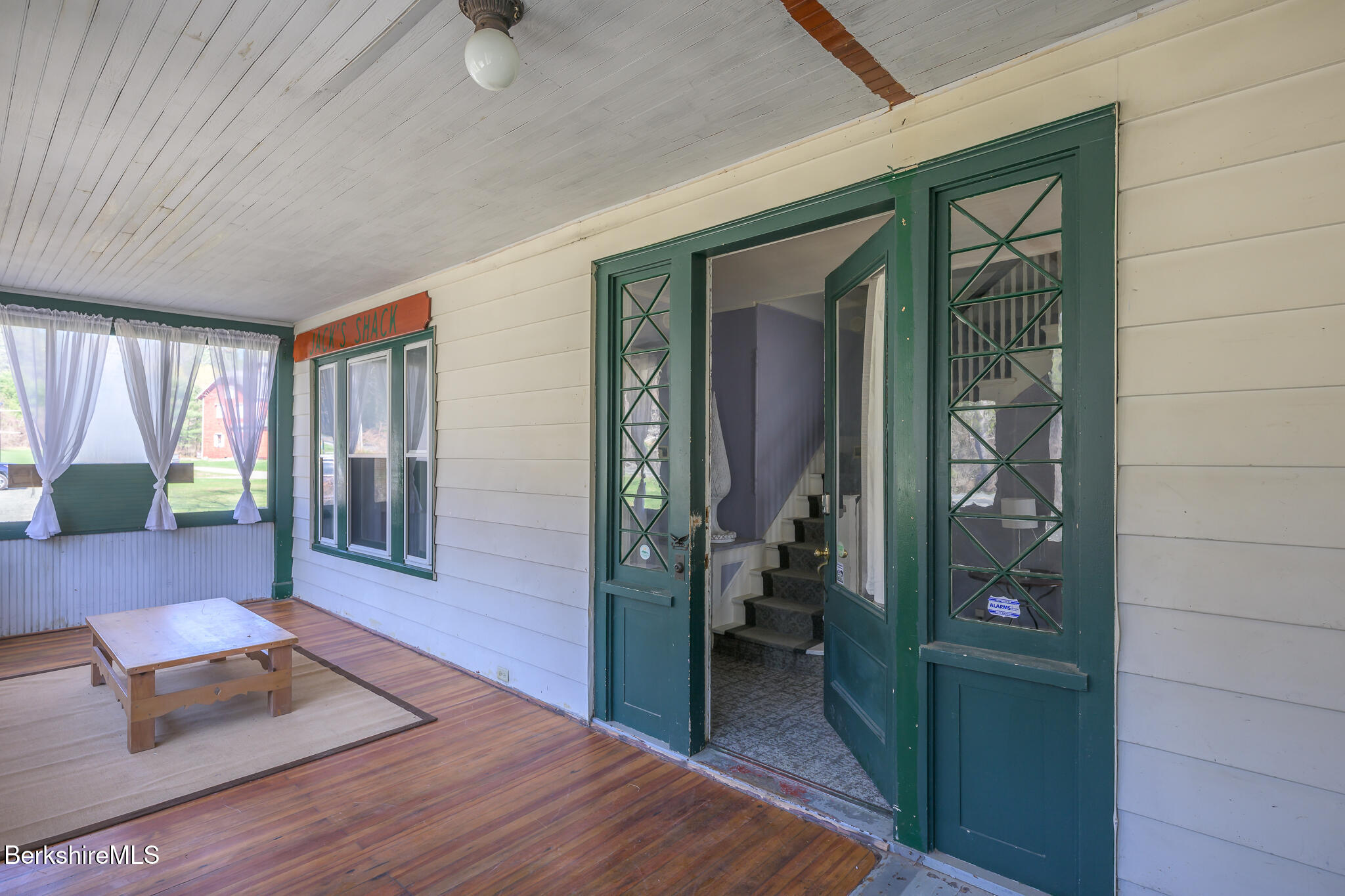 6 East Street Stockbridge, MA 01262 - Photo 4 of 23 a view of an entryway and livingroom in right side