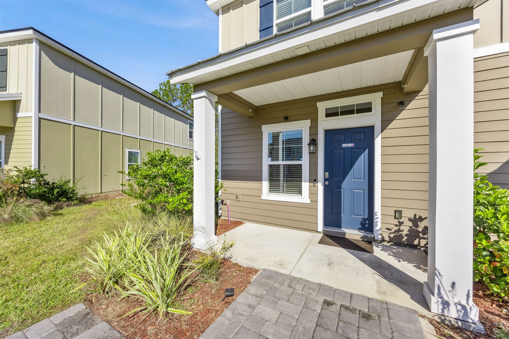 86440 Shortline Circle Yulee, FL 32097 - Photo 5 of 50 a view of a entryway door front of house